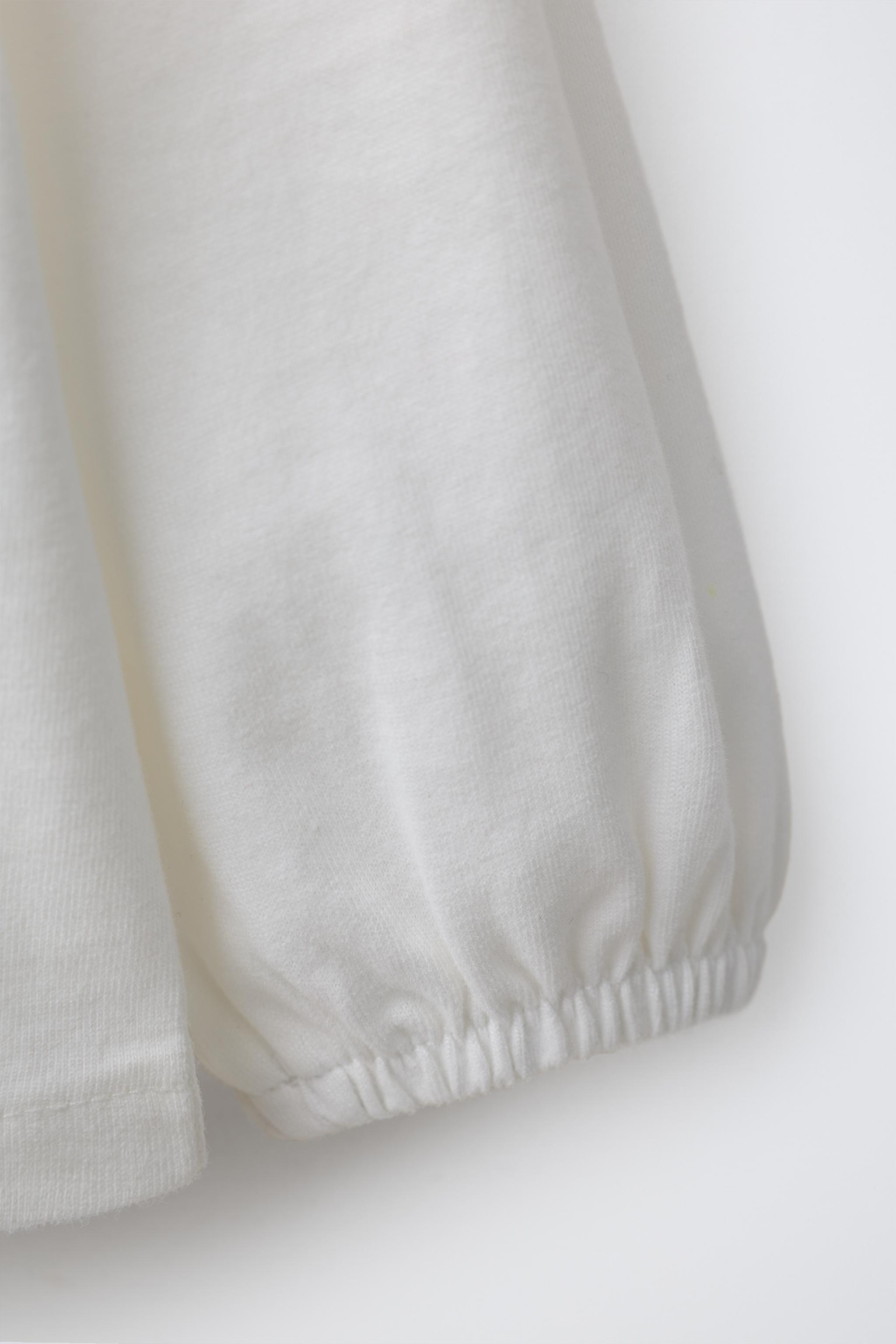 T-SHIRT À COL BRODÉ
